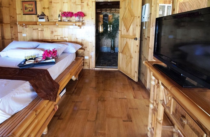 Imagen de la habitación del Hotel The Coral Blue Oriental Beach Villas and Suites. Foto 4