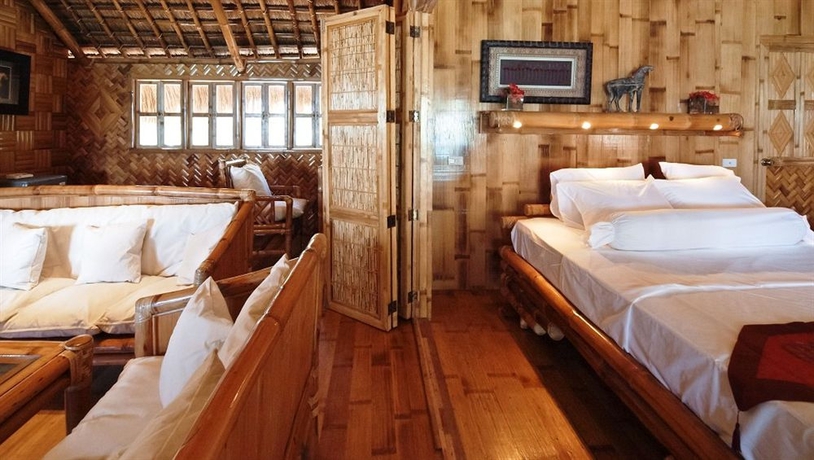 Imagen de la habitación del Hotel The Coral Blue Oriental Beach Villas and Suites. Foto 5