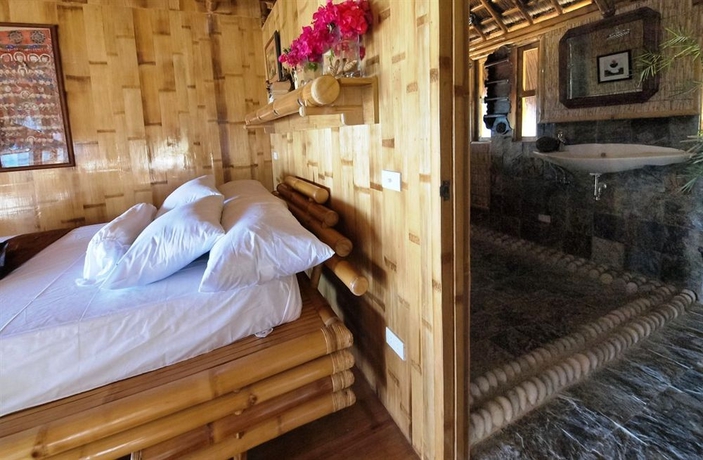 Imagen de la habitación del Hotel The Coral Blue Oriental Beach Villas and Suites. Foto 6