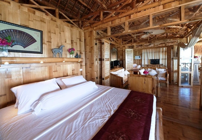 Imagen de la habitación del Hotel The Coral Blue Oriental Beach Villas and Suites. Foto 7