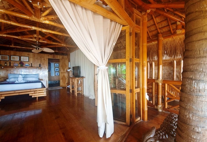 Imagen de la habitación del Hotel The Coral Blue Oriental Beach Villas and Suites. Foto 8