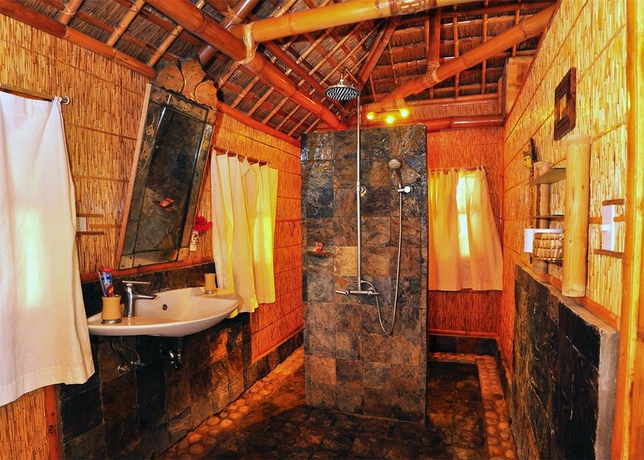 Imagen de la habitación del Hotel The Coral Blue Oriental Beach Villas and Suites. Foto 9