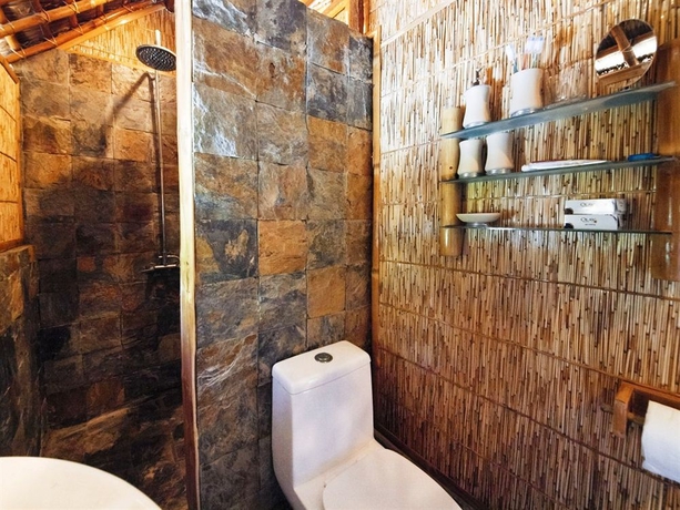 Imagen de la habitación del Hotel The Coral Blue Oriental Beach Villas and Suites. Foto 10