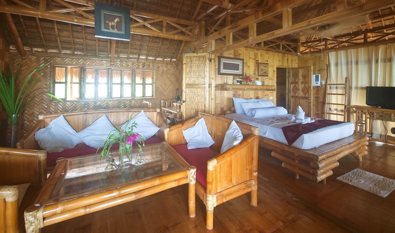 Imagen de la habitación del Hotel The Coral Blue Oriental Beach Villas and Suites. Foto 13