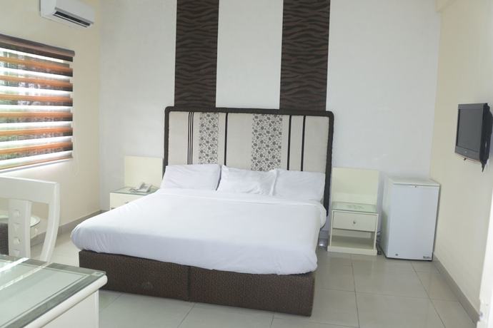 Imagen de la habitación del Hotel The Coral Reef. Foto 7