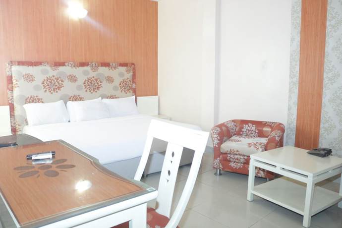 Imagen de la habitación del Hotel The Coral Reef. Foto 14