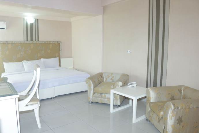 Imagen de la habitación del Hotel The Coral Reef. Foto 16