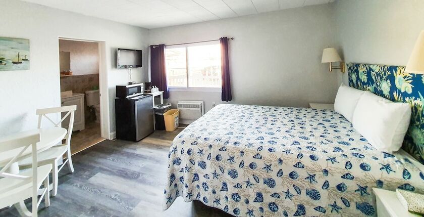 Imagen de la habitación del Hotel The Coral Sands Motel. Foto 11