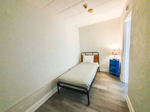 Imagen de la habitación del Hotel The Coral Sands Motel. Foto 12