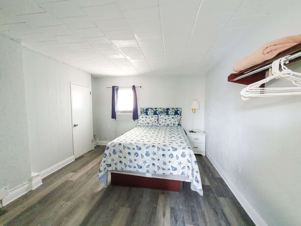 Imagen de la habitación del Hotel The Coral Sands Motel. Foto 13