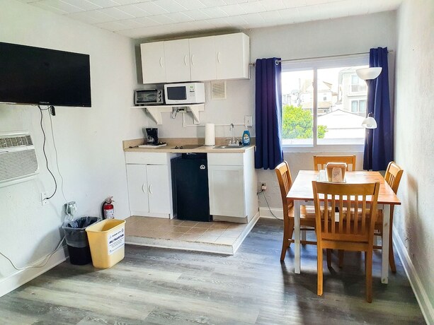 Imagen de la habitación del Hotel The Coral Sands Motel. Foto 15