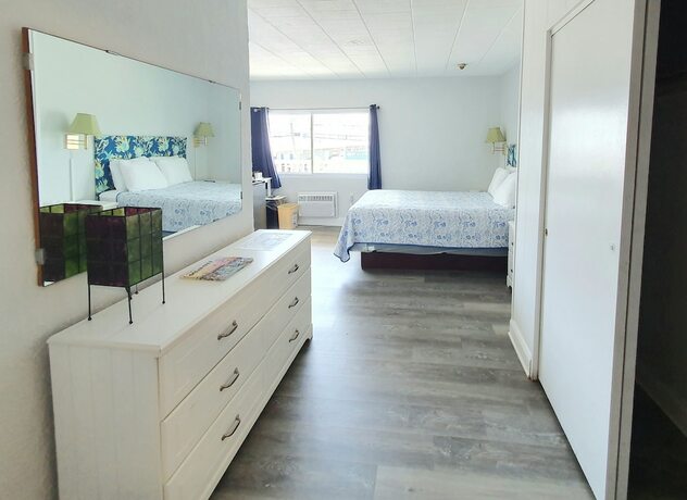 Imagen de la habitación del Hotel The Coral Sands Motel. Foto 17