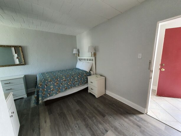 Imagen de la habitación del Hotel The Coral Sands Motel. Foto 19