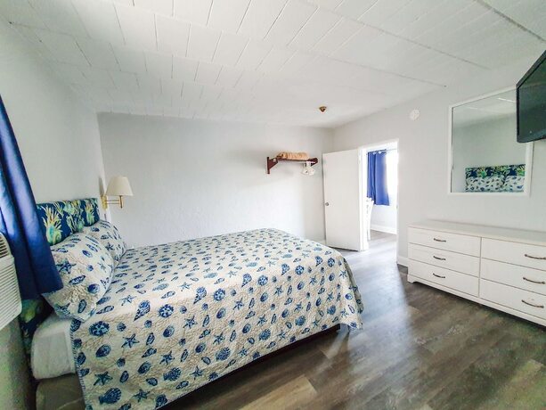 Imagen de la habitación del Hotel The Coral Sands Motel. Foto 20