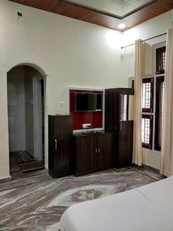 Imagen de la habitación del Hotel The Corbett Jungle. Foto 22