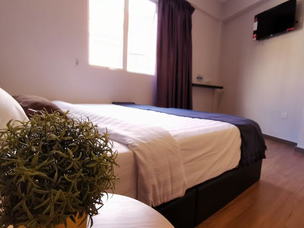 Imagen de la habitación del Hotel The Core Hotel. Foto 6