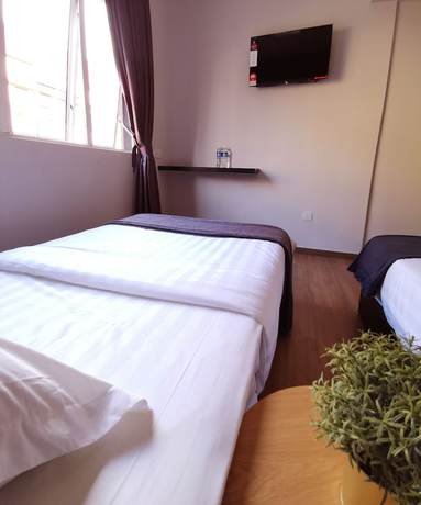 Imagen de la habitación del Hotel The Core Hotel. Foto 9