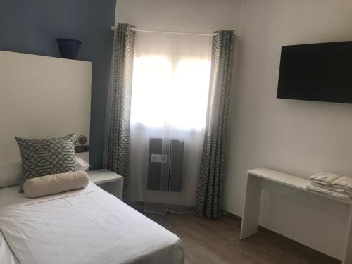 Imagen de la habitación del Hotel The Corner House Boutique. Foto 4