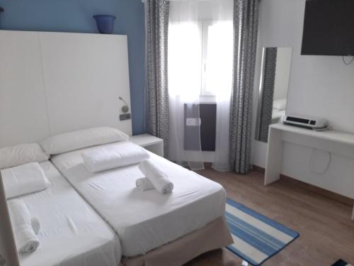 Imagen de la habitación del Hotel The Corner House Boutique. Foto 5