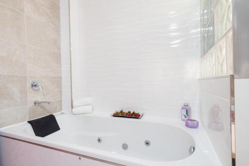 Imagen de la habitación del Hotel The Corner House Boutique. Foto 9