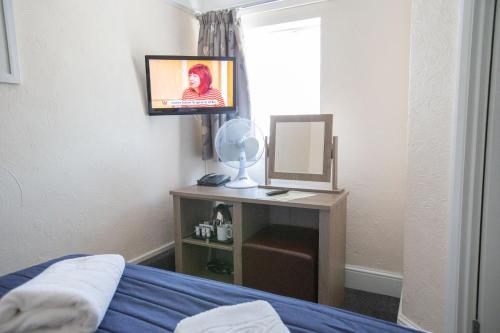 Imagen de la habitación del Hotel The Corner House Gatwick. Foto 7