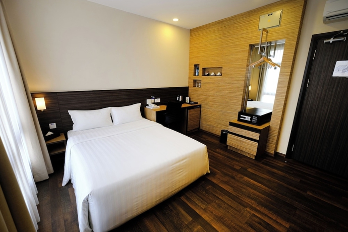Imagen de la habitación del Hotel The Corner House, Kuala Belait. Foto 8