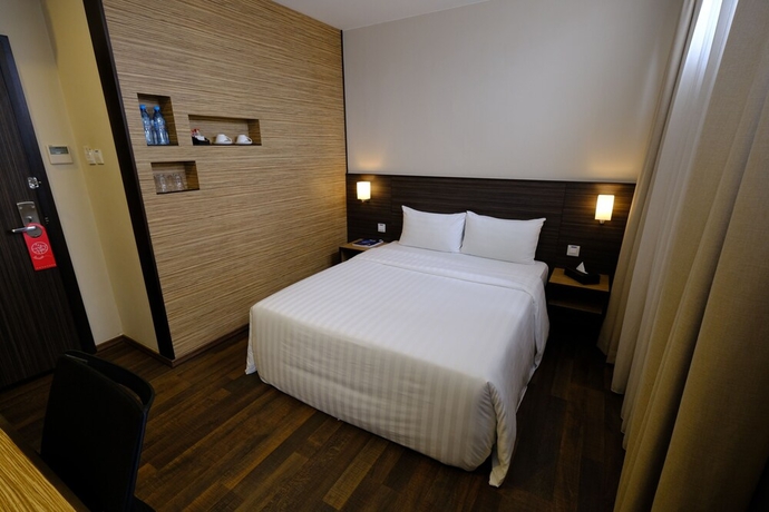 Imagen de la habitación del Hotel The Corner House, Kuala Belait. Foto 10