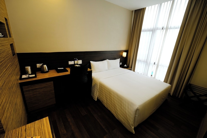 Imagen de la habitación del Hotel The Corner House, Kuala Belait. Foto 11