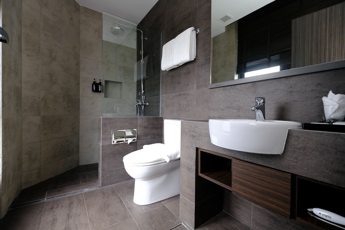Imagen de la habitación del Hotel The Corner House, Kuala Belait. Foto 12