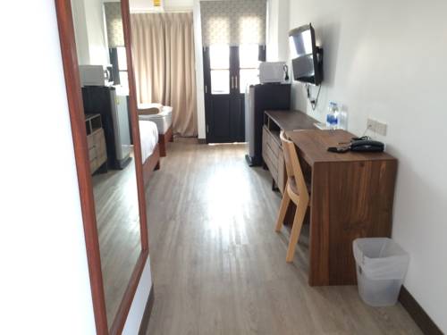 Imagen de la habitación del Hotel The Corner Lodge. Foto 5