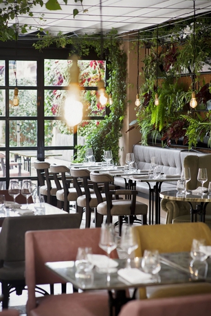 Imagen del bar/restaurante del Hotel The Corner Roma. Foto 6