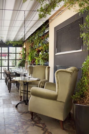 Imagen del bar/restaurante del Hotel The Corner Roma. Foto 8