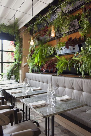 Imagen del bar/restaurante del Hotel The Corner Roma. Foto 11