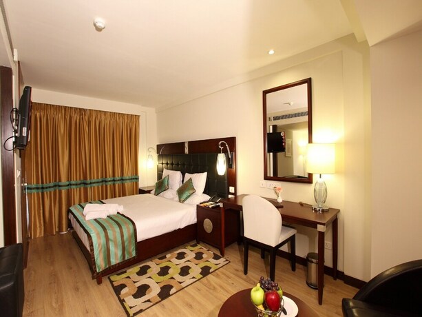 Imagen de la habitación del Hotel The Corporate. Foto 20