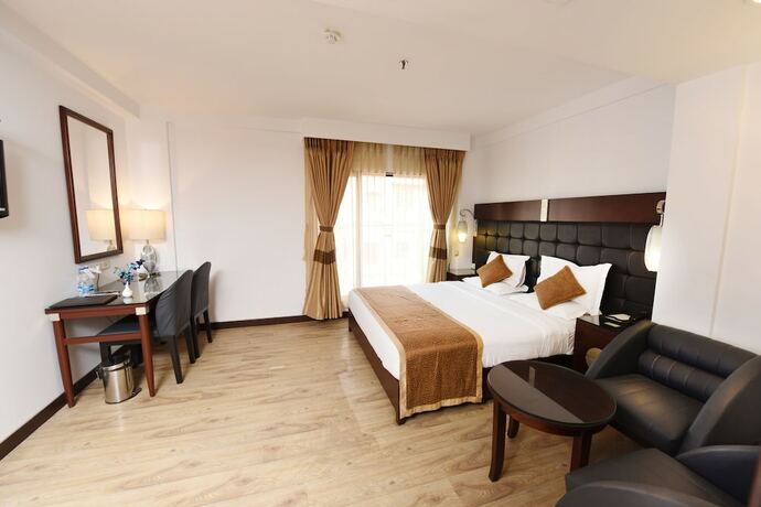 Imagen de la habitación del Hotel The Corporate. Foto 23