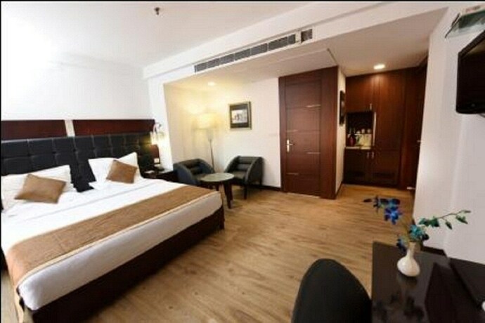 Imagen de la habitación del Hotel The Corporate. Foto 26