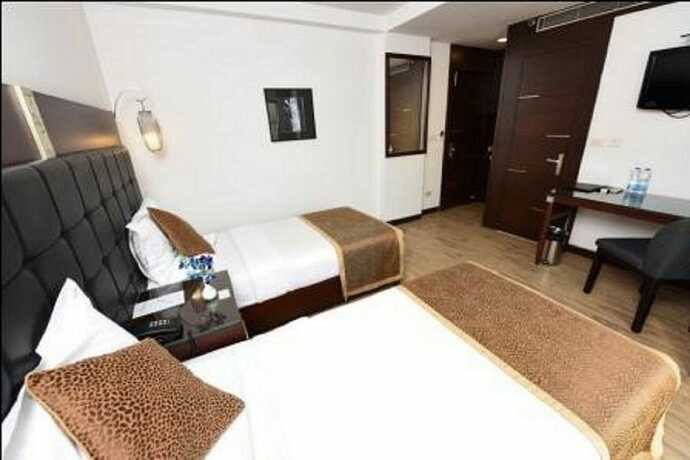 Imagen de la habitación del Hotel The Corporate. Foto 27