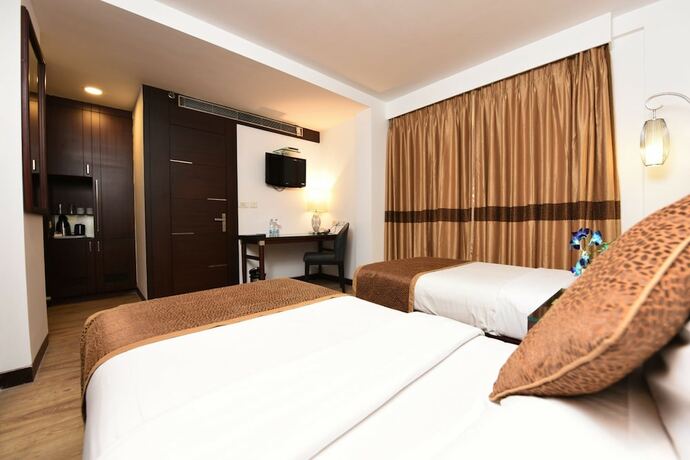 Imagen de la habitación del Hotel The Corporate. Foto 31