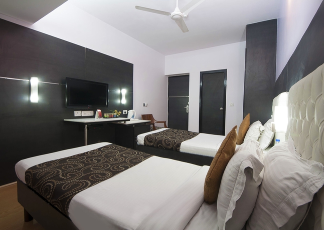 Imagen de la habitación del Hotel The Corus. Foto 10