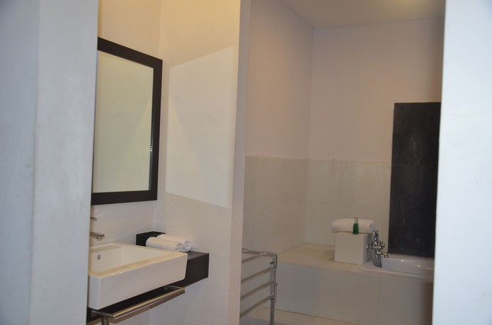 Imagen de la habitación del Hotel The Cory Villa. Foto 11
