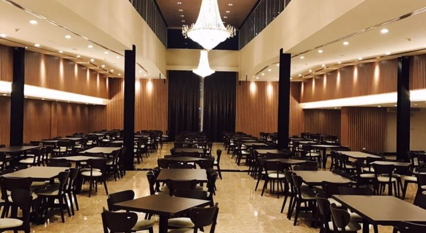 Imagen del bar/restaurante del Hotel The Cotai Luxury Design. Foto 3