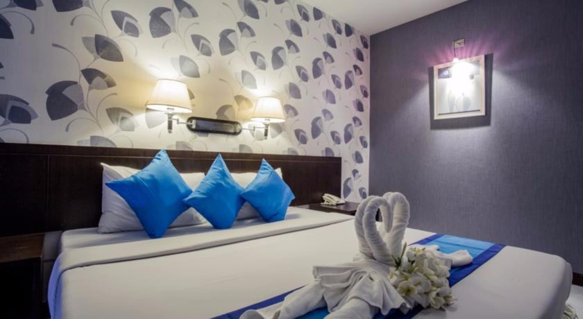 Imagen de la habitación del Hotel The Cotai Luxury Design. Foto 6