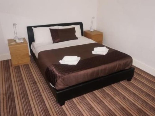 Imagen de la habitación del Hotel The Cotswold. Foto 3