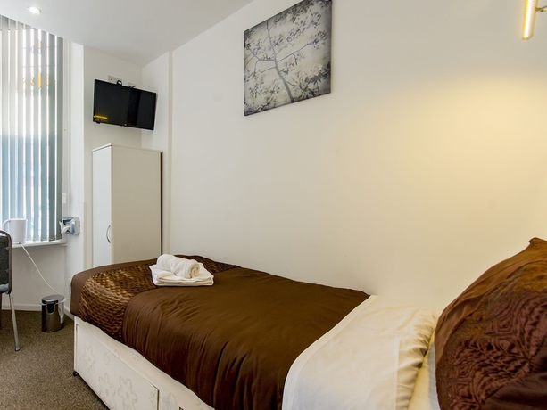 Imagen de la habitación del Hotel The Cotswold. Foto 5