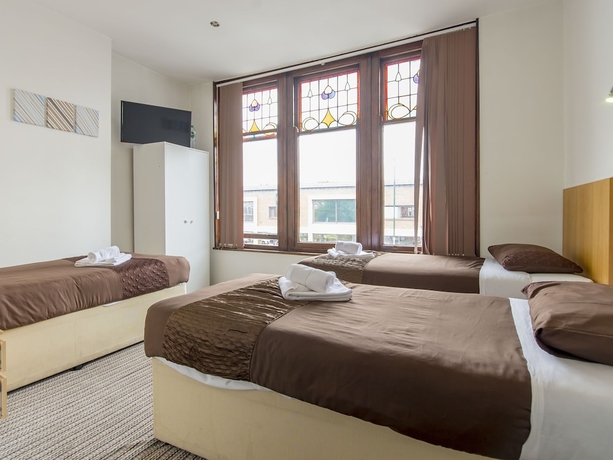 Imagen de la habitación del Hotel The Cotswold. Foto 8