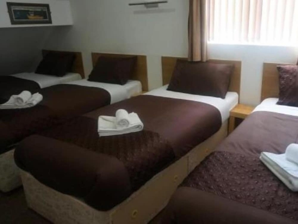 Imagen de la habitación del Hotel The Cotswold. Foto 12