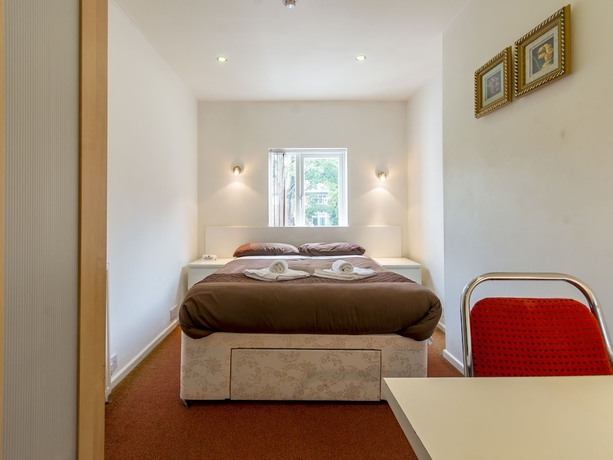 Imagen de la habitación del Hotel The Cotswold. Foto 13