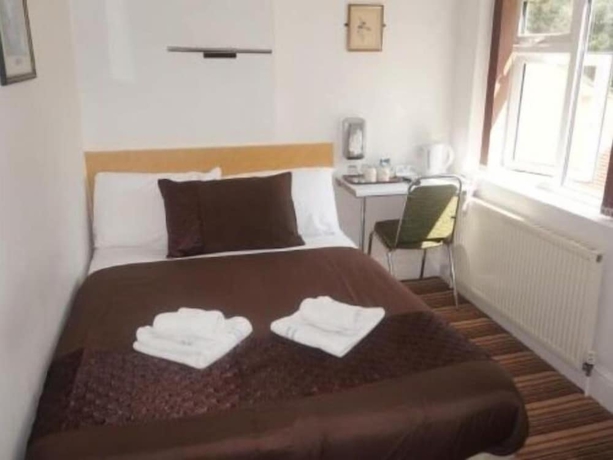 Imagen de la habitación del Hotel The Cotswold. Foto 15