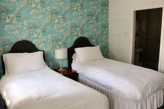 Imagen de la habitación del Hotel The Cottage. Foto 9