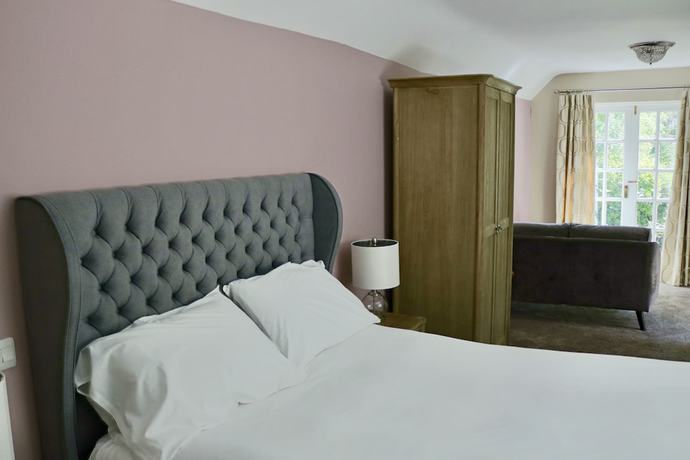 Imagen de la habitación del Hotel The Cottage. Foto 13